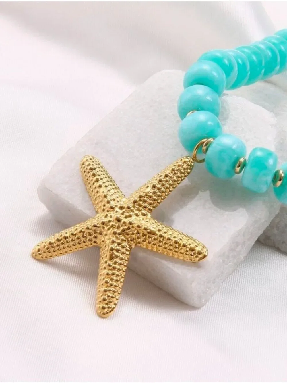 Anthropologie bold turquoise